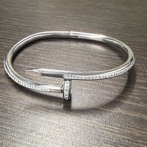 Stylish Silver Nail-Inspired Bracelet